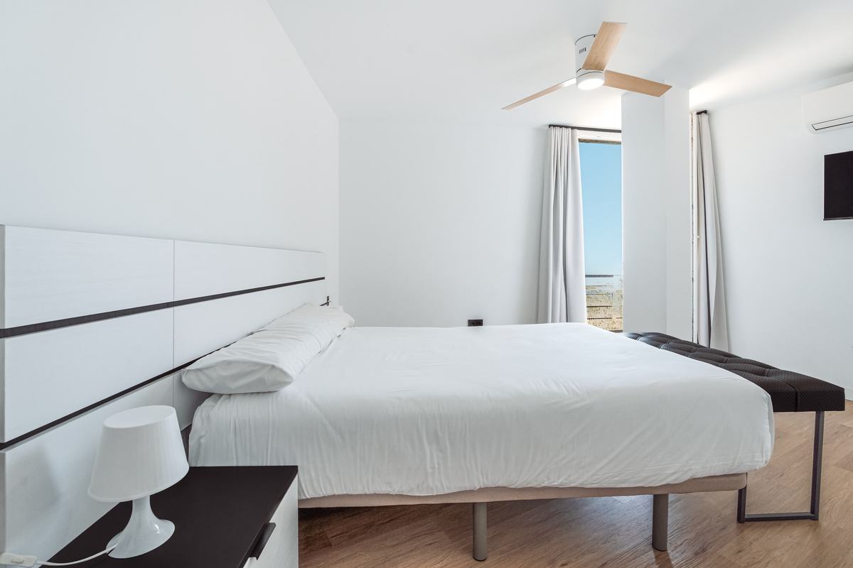 Main bedroom opening onto the balcony